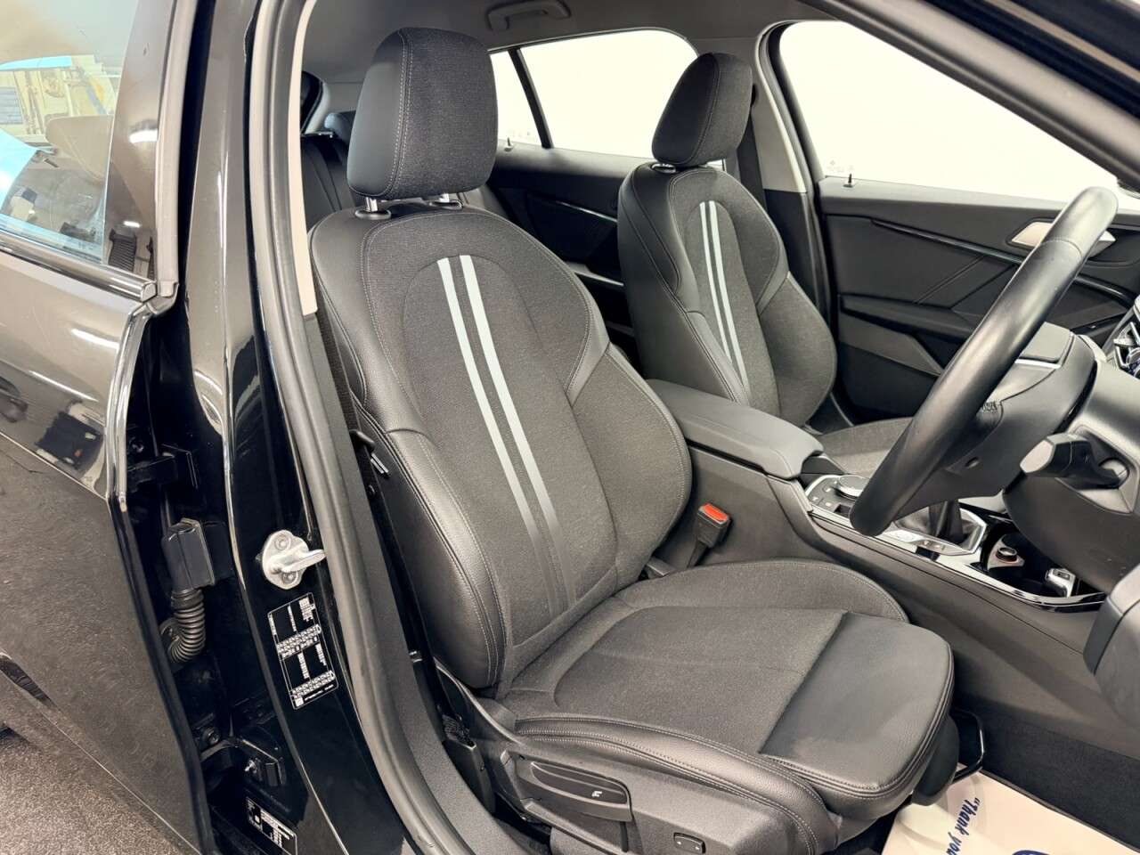 A 2020 BMW 1 SERIES 118i SPORT FIVE DOOR 140 BHP + SAT NAV + PARKING SENSORS SIX MONTH WARRANTY A 2020 BMW 1 SERIES 118i SPORT FIVE DOOR 140 BHP + SAT NAV + PARKING SENSORS SIX MONTH WARRANTY