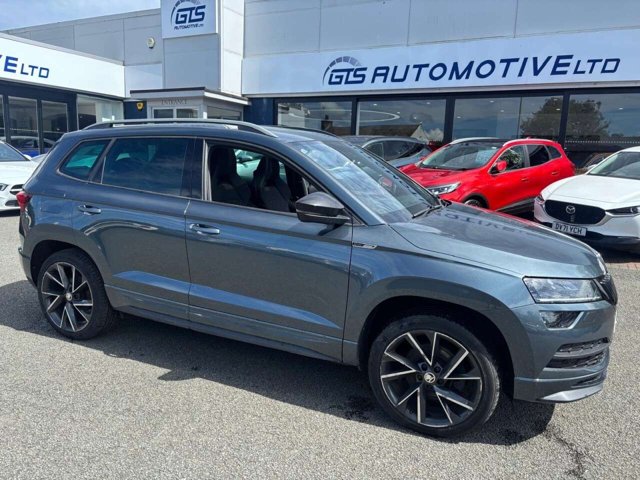 A 2019 SKODA KAROQ 2.0 TDI SPORTLINE 4WD 150 BHP + SAT NAV + GLASS SUNROOF + HEATED SEATS A 2019 SKODA KAROQ 2.0 TDI SPORTLINE 4WD 150 BHP + SAT NAV + GLASS SUNROOF + HEATED SEATS