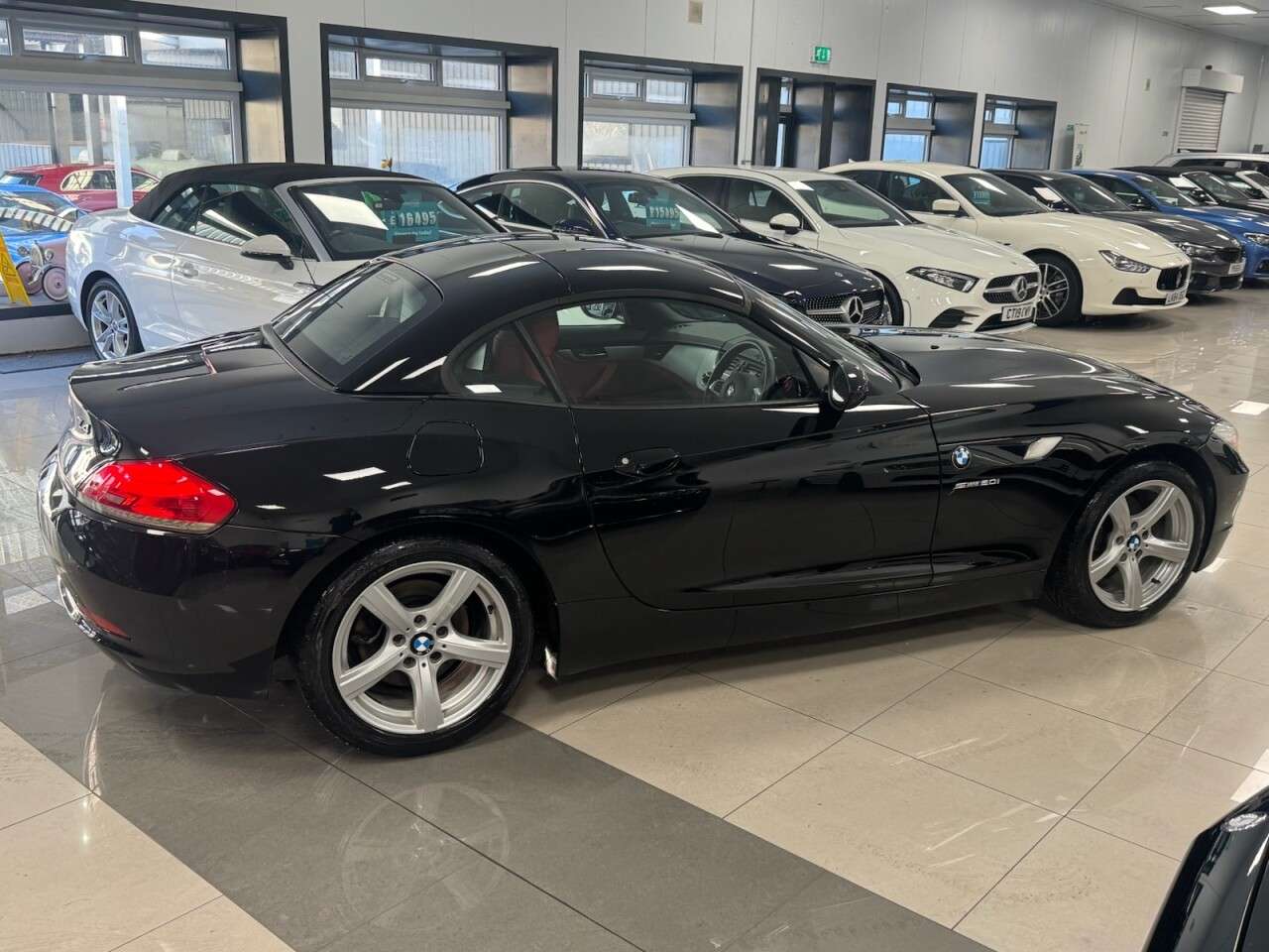 A 2012 BMW Z4 2.0 20i Convertible 2dr Petrol Manual sDrive Euro 5 (s/s) (184 ps) BLACK + A 2012 BMW Z4 2.0 20i Convertible 2dr Petrol Manual sDrive Euro 5 (s/s) (184 ps) BLACK +