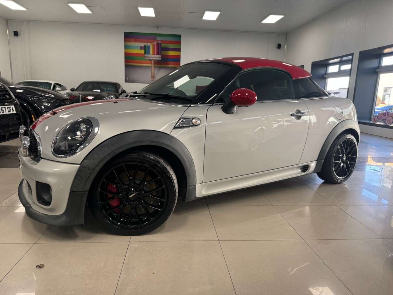 A 2013 MINI COUPE 1.6 John Cooper Works Coupe 2dr Petrol Manual Euro 5 (211 ps) GREAT HISTORY A 2013 MINI COUPE 1.6 John Cooper Works Coupe 2dr Petrol Manual Euro 5 (211 ps) GREAT HISTORY