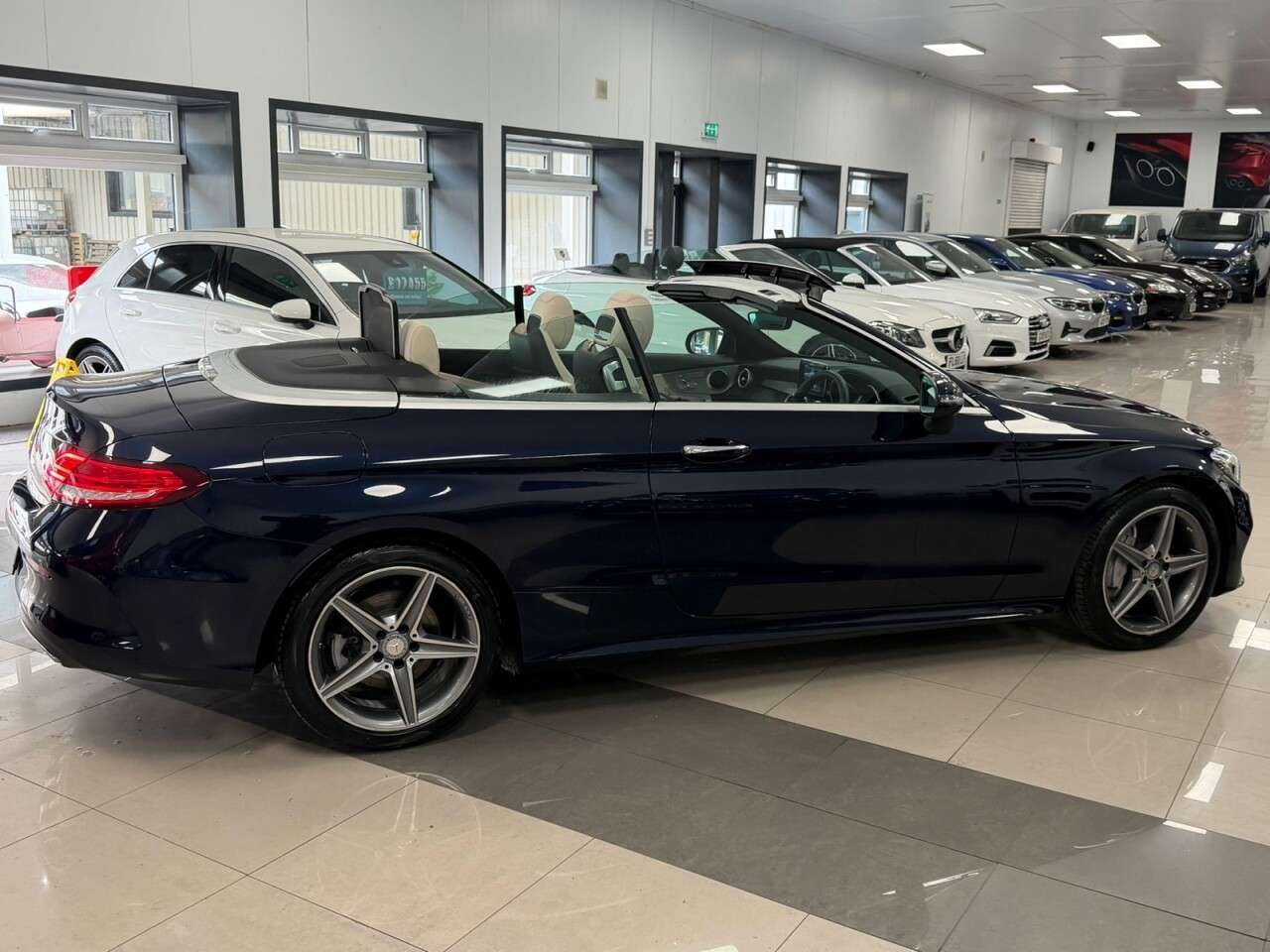 A 2017 MERCEDES-BENZ C-CLASS 2.0 C300 AMG Line Cabriolet 2dr Petrol G-Tronic+ Euro 6 (s/s) (245 ps) AIRS A 2017 MERCEDES-BENZ C-CLASS 2.0 C300 AMG Line Cabriolet 2dr Petrol G-Tronic+ Euro 6 (s/s) (245 ps) AIRS