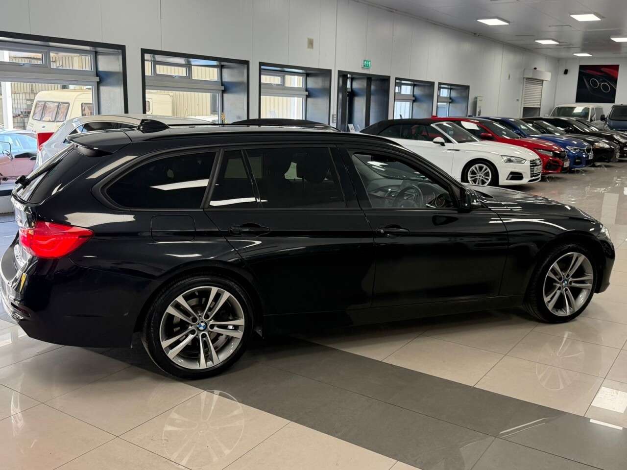 A 2017 BMW 3 SERIES 1.5 318i Sport Touring 5dr Petrol Auto Euro 6 (s/s) (136 ps) A 2017 BMW 3 SERIES 1.5 318i Sport Touring 5dr Petrol Auto Euro 6 (s/s) (136 ps)