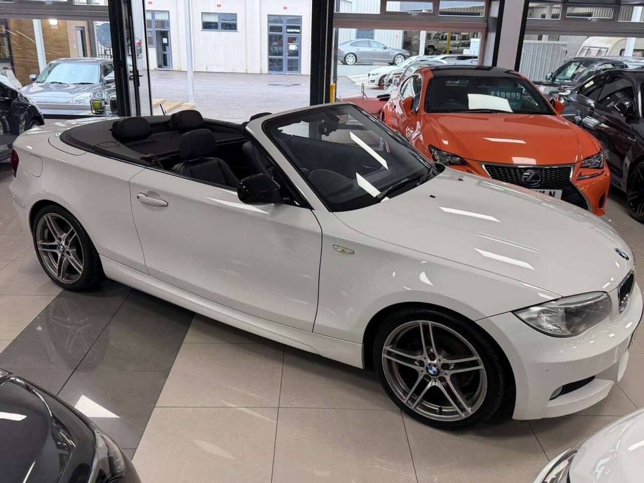 A 2012 BMW 1 SERIES 2.0 118i Sport Plus Edition Convertible 2dr Petrol Manual Euro 5 (s/s) (143 A 2012 BMW 1 SERIES 2.0 118i Sport Plus Edition Convertible 2dr Petrol Manual Euro 5 (s/s) (143