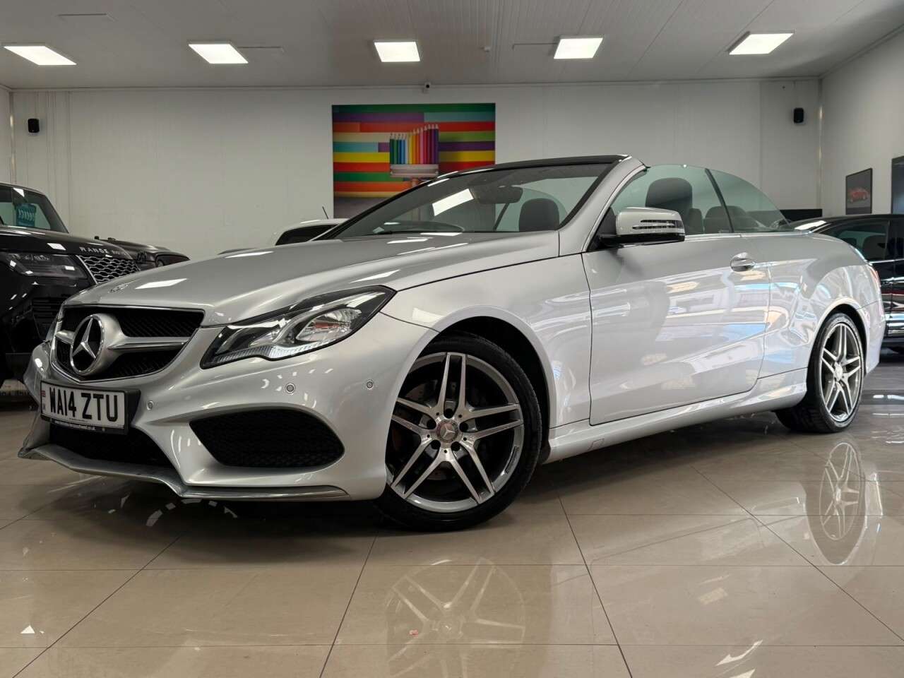 A 2014 MERCEDES-BENZ E CLASS 2.1 E220 CDI AMG Sport Cabriolet 2dr Diesel G-Tronic+ Euro 5 (s/s) (170 ps) A 2014 MERCEDES-BENZ E CLASS 2.1 E220 CDI AMG Sport Cabriolet 2dr Diesel G-Tronic+ Euro 5 (s/s) (170 ps)