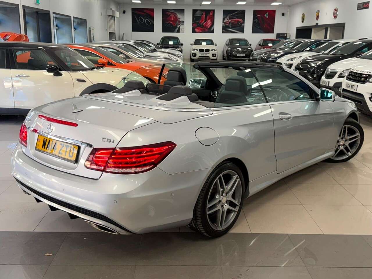 A 2014 MERCEDES-BENZ E CLASS 2.1 E220 CDI AMG Sport Cabriolet 2dr Diesel G-Tronic+ Euro 5 (s/s) (170 ps) A 2014 MERCEDES-BENZ E CLASS 2.1 E220 CDI AMG Sport Cabriolet 2dr Diesel G-Tronic+ Euro 5 (s/s) (170 ps)