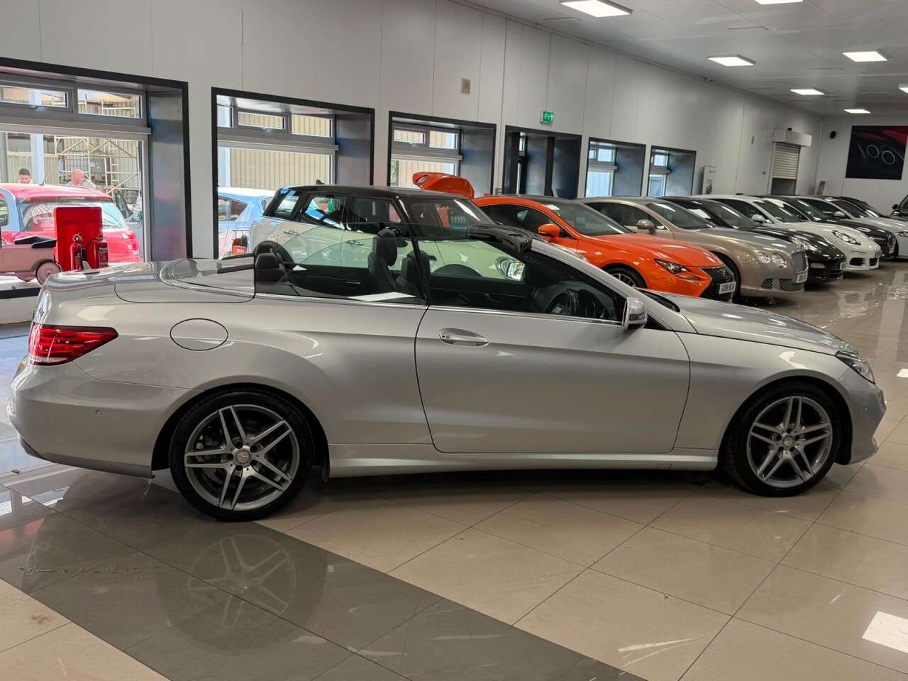 A 2014 MERCEDES-BENZ E CLASS 2.1 E220 CDI AMG Sport Cabriolet 2dr Diesel G-Tronic+ Euro 5 (s/s) (170 ps) A 2014 MERCEDES-BENZ E CLASS 2.1 E220 CDI AMG Sport Cabriolet 2dr Diesel G-Tronic+ Euro 5 (s/s) (170 ps)