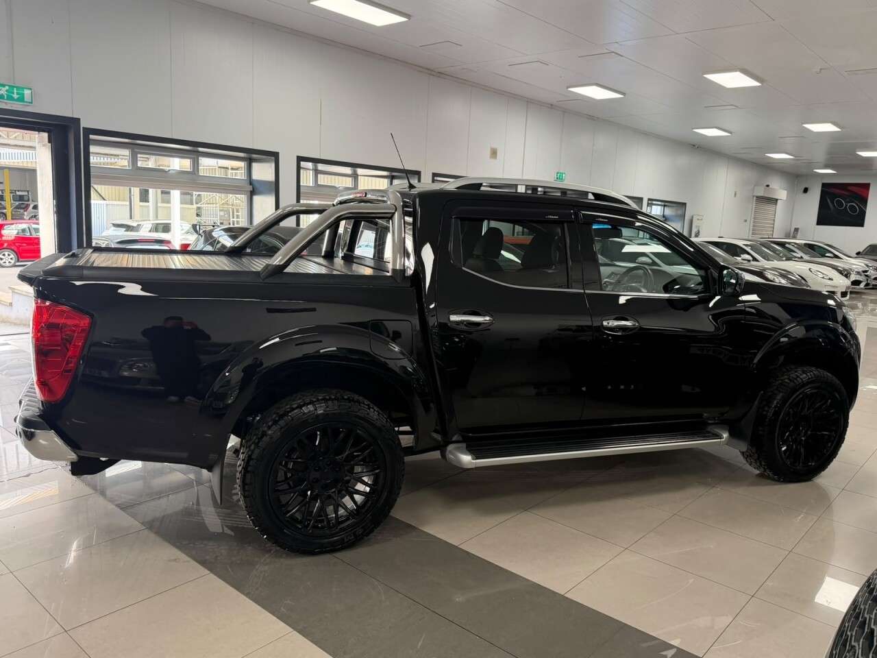 A 2016 NISSAN NAVARA 2.3 dCi Tekna Pickup Double Cab 4dr Diesel Manual 4WD Euro 6 (s/s) (190 ps) A 2016 NISSAN NAVARA 2.3 dCi Tekna Pickup Double Cab 4dr Diesel Manual 4WD Euro 6 (s/s) (190 ps)