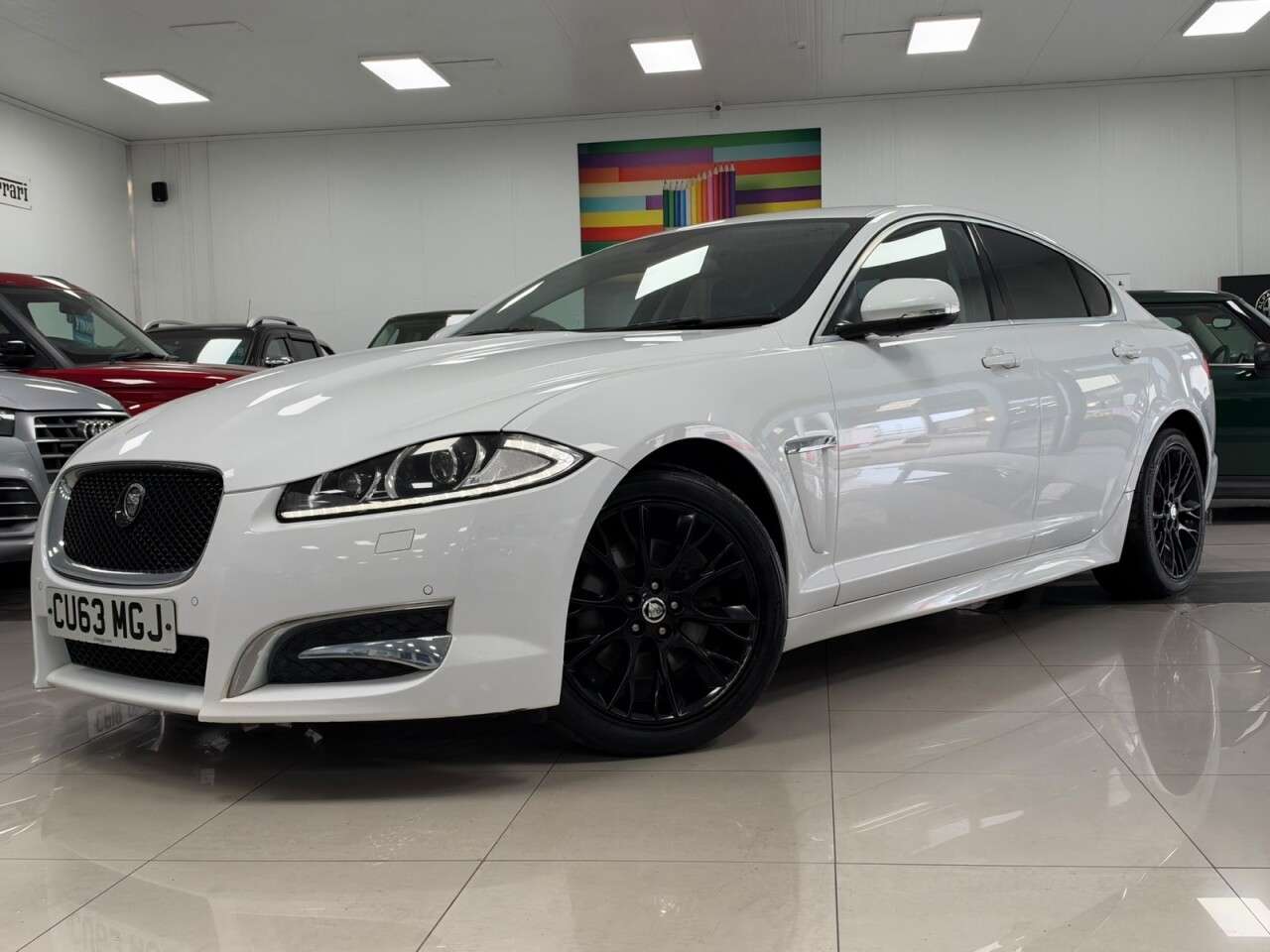 A 2013 JAGUAR XF 2.2d Sport Saloon 4dr Diesel Auto Euro 5 (s/s) (200 ps) A 2013 JAGUAR XF 2.2d Sport Saloon 4dr Diesel Auto Euro 5 (s/s) (200 ps)