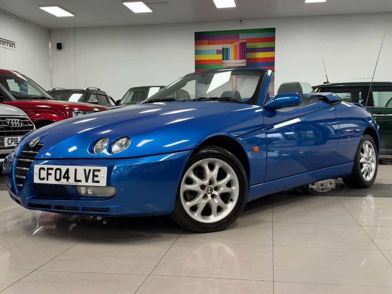 A 2004 ALFA ROMEO SPIDER 2.0 JTS Lusso Convertible 2dr Petrol Manual (220 g/km, 165 bhp) A 2004 ALFA ROMEO SPIDER 2.0 JTS Lusso Convertible 2dr Petrol Manual (220 g/km, 165 bhp)