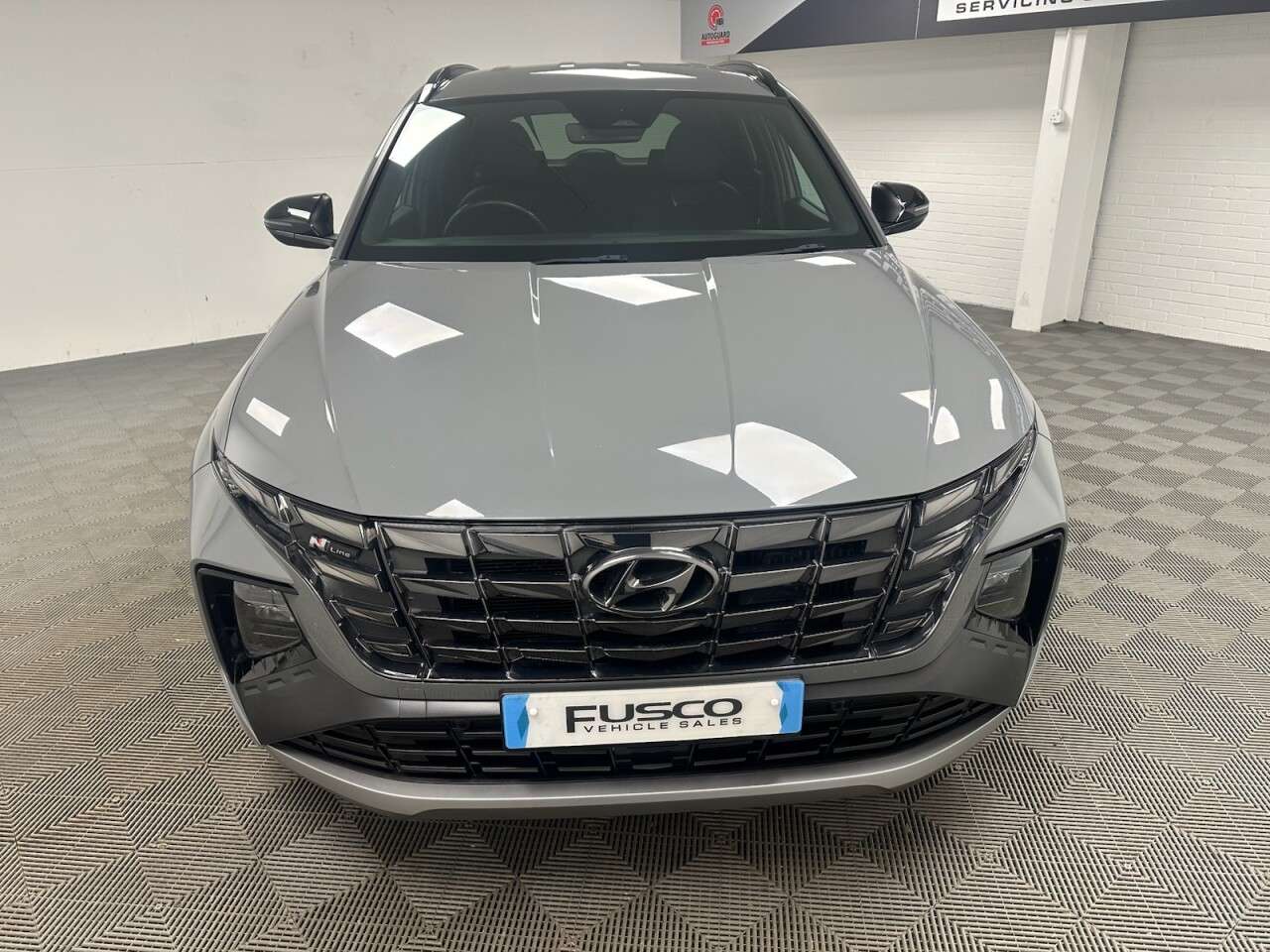 A 2021 HYUNDAI TUCSON 1.6 h T-GDi N Line SUV 5dr Petrol Hybrid Auto Euro 6 (s/s) (230 ps) front a A 2021 HYUNDAI TUCSON 1.6 h T-GDi N Line SUV 5dr Petrol Hybrid Auto Euro 6 (s/s) (230 ps) front a