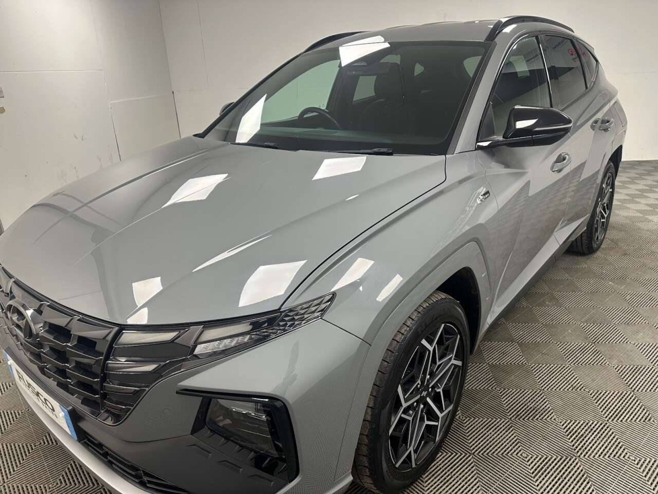 A 2021 HYUNDAI TUCSON 1.6 h T-GDi N Line SUV 5dr Petrol Hybrid Auto Euro 6 (s/s) (230 ps) front a A 2021 HYUNDAI TUCSON 1.6 h T-GDi N Line SUV 5dr Petrol Hybrid Auto Euro 6 (s/s) (230 ps) front a