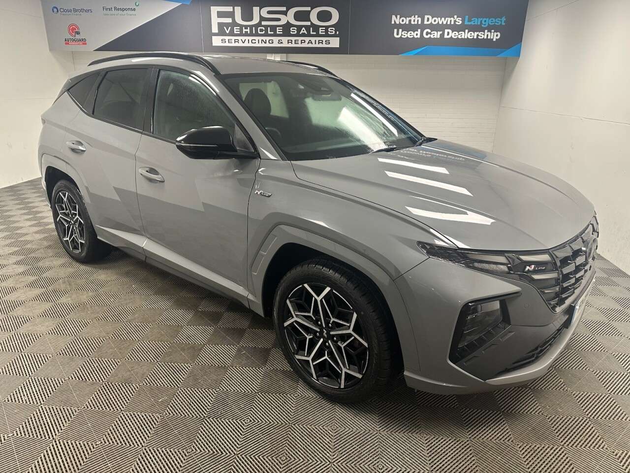 A 2021 HYUNDAI TUCSON 1.6 h T-GDi N Line SUV 5dr Petrol Hybrid Auto Euro 6 (s/s) (230 ps) front a A 2021 HYUNDAI TUCSON 1.6 h T-GDi N Line SUV 5dr Petrol Hybrid Auto Euro 6 (s/s) (230 ps) front a