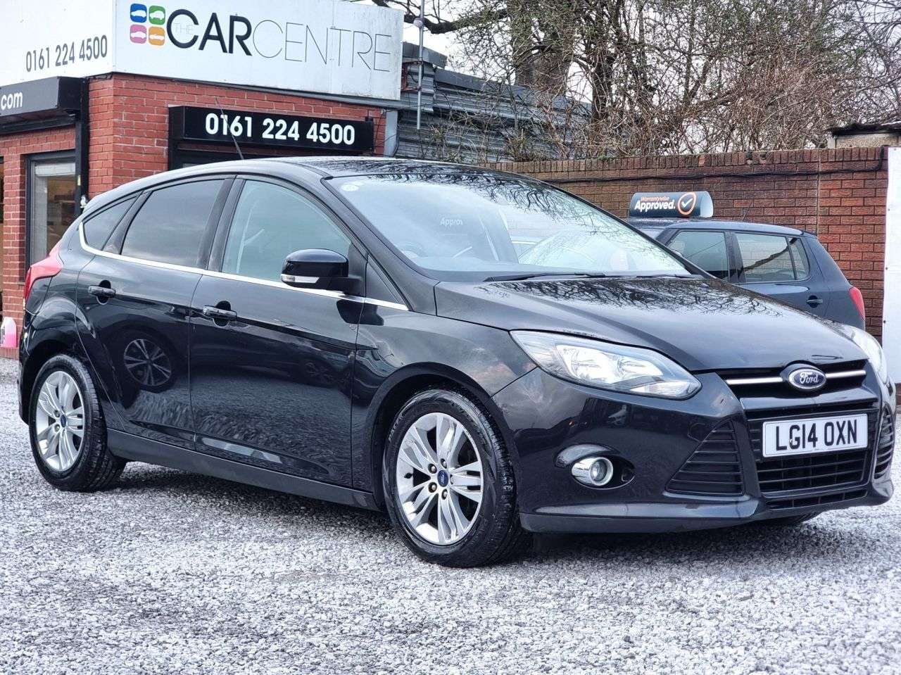 A 2014 FORD FOCUS 1.6 TDCi Titanium Navigator Hatchback 5dr Diesel Manual Euro 5 (s/s) (115 p A 2014 FORD FOCUS 1.6 TDCi Titanium Navigator Hatchback 5dr Diesel Manual Euro 5 (s/s) (115 p