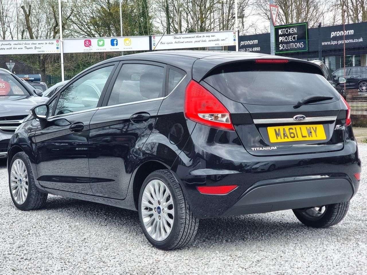 A 2011 FORD FIESTA 1.4 Titanium Hatchback 5dr Petrol Manual (133 g/km, 94 bhp) A 2011 FORD FIESTA 1.4 Titanium Hatchback 5dr Petrol Manual (133 g/km, 94 bhp)